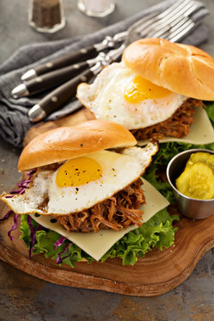 Pulled pork breakfast sandwiches with fried egg