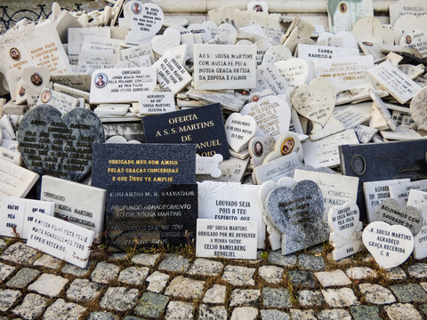 Lisbon - Circa April 2017: Votive offerings for Dr. Sousa Martins (a secular saint) under his statue at Campo Martires da Patria in Lisbon