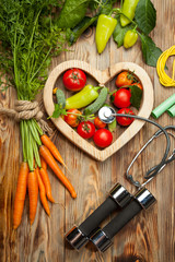 Vegetables in the heart. Diet, healthy lifestyle on a rustic wooden background - 168648587