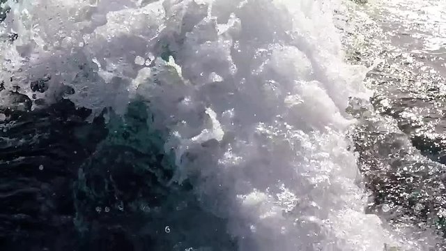 Wake left by a motor boat in slow motion