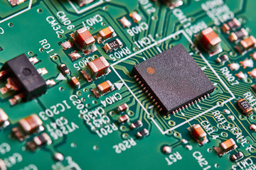 Electronic circuit board close up.