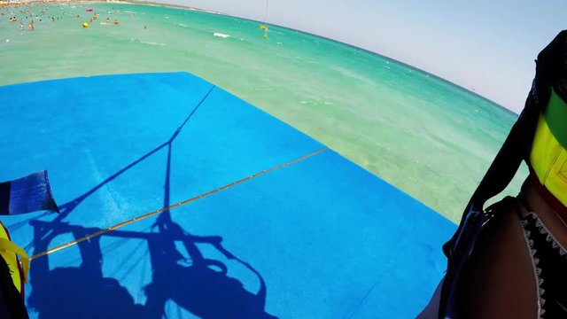 parasailing take-off near the sea