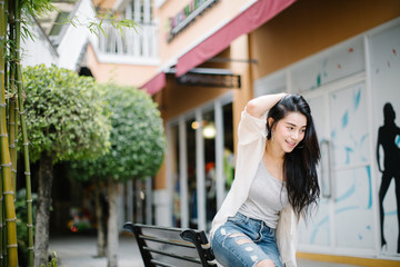 Portrait of beautiful young Asia woman on the street.