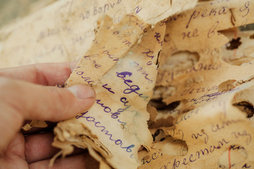 Discovery of old documents, letters of past centuries or paper manuscripts in unknown language, spoiled by time. Secret concept