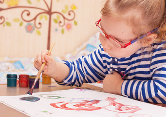 girl sitting at the table