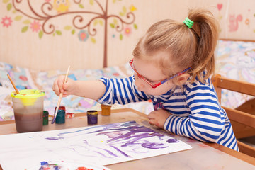 girl sitting at the table