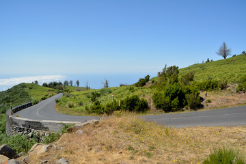 Fototapeta na wymiar Winding mountain road in volcanic island, madeira