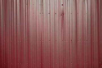 Obraz premium Red iron fence. Fencing of the territory.