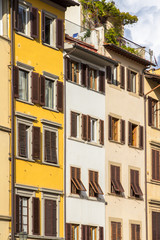 Fototapeta na wymiar Old house with shutters in Florence, Italy