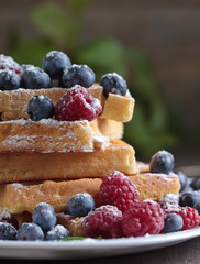 Waffles with raspberry and blueberry