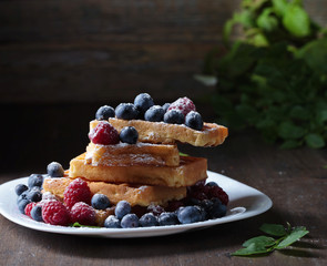 Waffles with raspberry and blueberry