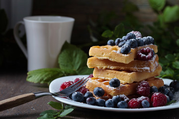 Waffles with raspberry and blueberry