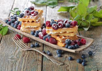 Waffles with raspberry and blueberry