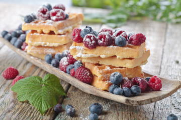 Waffles with raspberry and blueberry