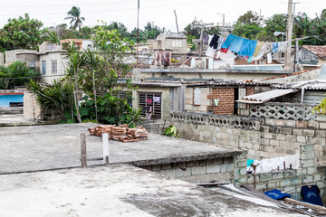 Fototapeta na wymiar Dilapidated houses in Gibara village, Cuba