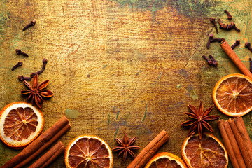 Christmas spices on old wooden vintage background