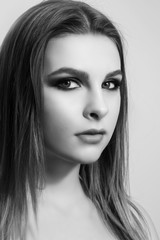 Fototapeta premium Fashionable portrait of a girl model. Fashion, smoky eyes makeup.