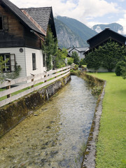Fototapeta na wymiar Town Hallstatt with mountain lake and salt mines. Alpine massif, beautiful canyon in Austria. Salzburg Alpine valley in summer, clear water. Destination for vacation, hiking and relaxation.