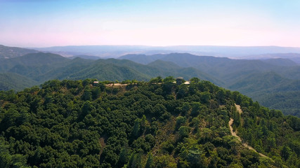 Obraz premium Mountain landscape. Island of cyprus Cedar Valley. The flight is high in the sky Fire station. A house in the forest for the foresters. Forestry