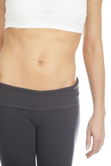 Fototapeta na wymiar Slim woman showing her abdomen