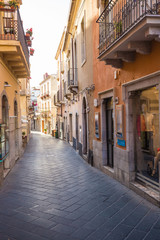 Fototapeta na wymiar Romantic street of Corso Umberto in beautiful town of Taormina, Sicily island, Italy