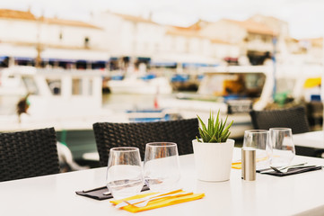 Served table at summer terrace seaside cafe