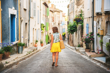 Sweet little girl enjoying summer vacation in Provence. Image taken in Valensole,...