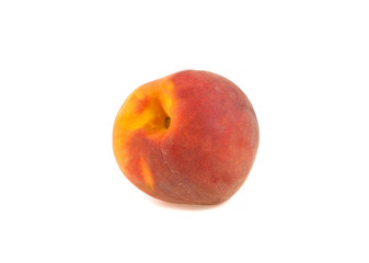 Juicy peach on a white background