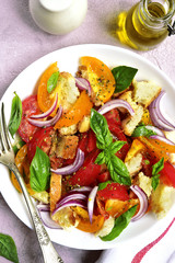 Panzanella - traditional italian tomato salad with bread and onion.Top view.