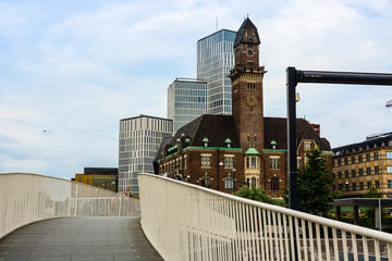 Fototapeta premium Malmo panoramic cityscape, Sweden. Modern buildings and old tower. Modern architecture exterior