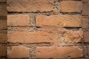 Brick wall in sight. Orange.