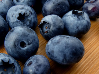 Blueberries isolated on a wooden board