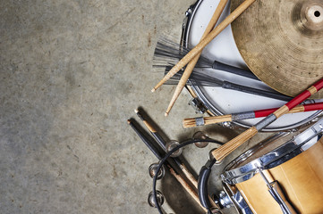 a pile of drum equipment