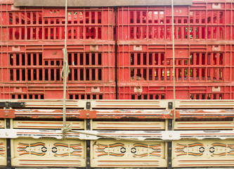 Red boxes baskets stacked in the truck