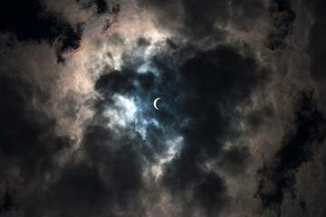 Naklejka na ściany i meble Solar Eclipse with Clouds