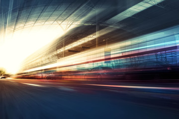 Fototapeta na wymiar Blurry chromatic color tunnel car traffic motion blur. Motion blur the speed and dynamics.