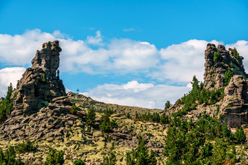 Blue sky with clouds over the mountain range