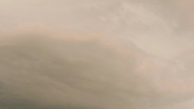 Skyscape or cloudscape. Overcast sky with stormy dark clouds moving across it. Weather. Time lapse. 4K ProRes HQ codec