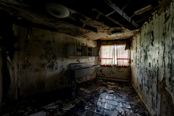 Fototapeta na wymiar Mold Covered Kitchen - Abandoned Resort