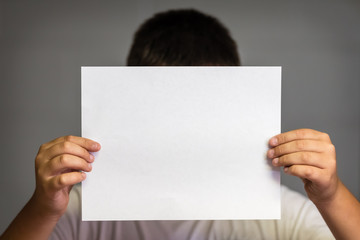 Boy with Blank Paper