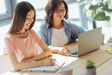 Nice smart students working on a project