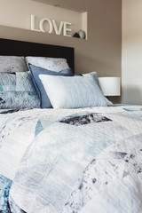 Close up of luxury bed linen in a master bedroom