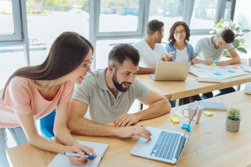 Cheerful delighted woman taking notes