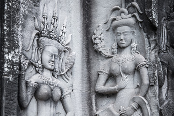 Detail of stone carvings of Apsara is a beautiful and seductive girl of Hindu mythology at Angkor Wat, Cambodia