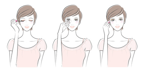 化粧をする女性