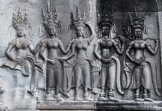 Detail of stone carvings of Apsara is a beautiful and seductive girl of Hindu mythology at Angkor Wat, Cambodia