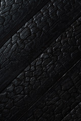 Black burnt wooden texture