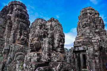 Prasat Bayon with smiling stone faces is the central temple of Angkor Thom Complex, Siem Reap, Cambodia. Ancient Khmer architecture and famous Cambodian landmark, World Heritage.