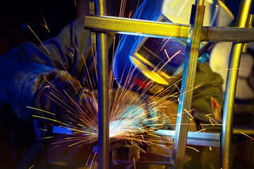 Welder erecting technical steel