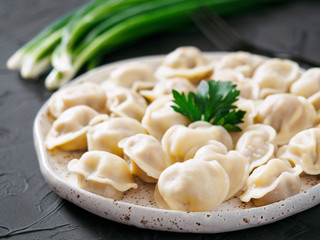 Russian pelmeni, ravioli, dumplings with meat